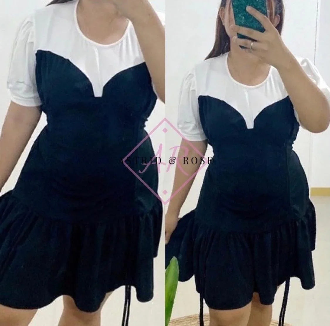 Plus size woman wearing short black and white dress with puff sleeves and ruffled hem