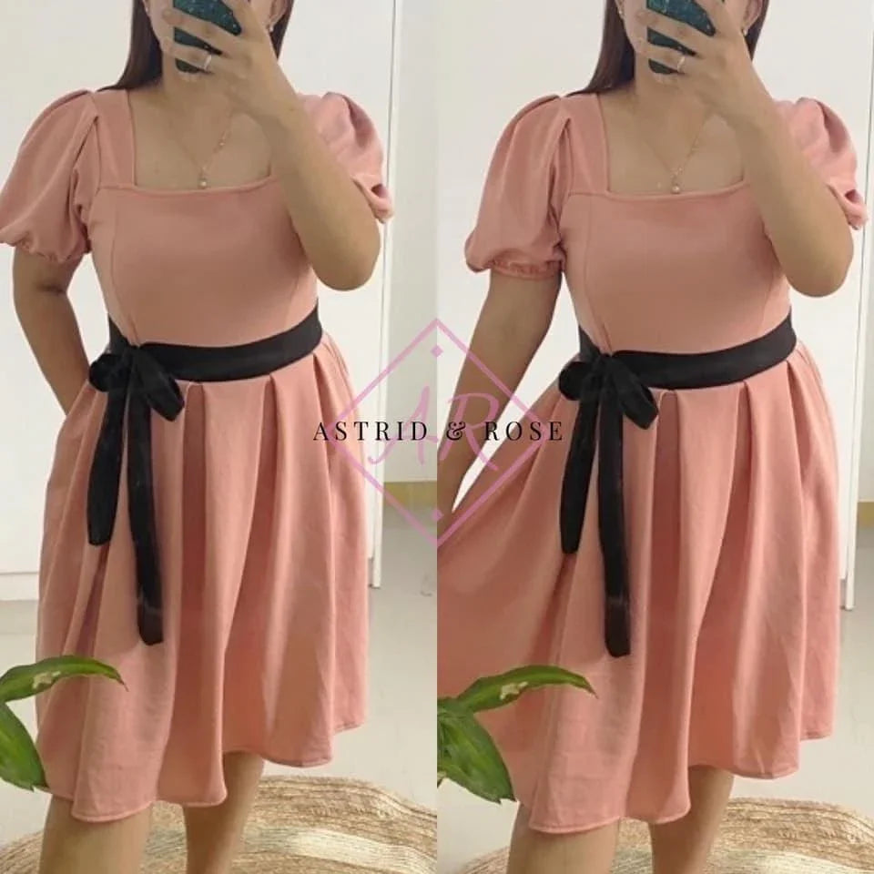 Plus size peach dress with puff sleeves, square neckline, and black waist sash, mirror selfie