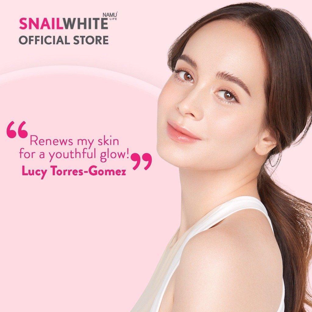 Woman with glowing skin on pink background, Snailwhite official store skincare testimonial.