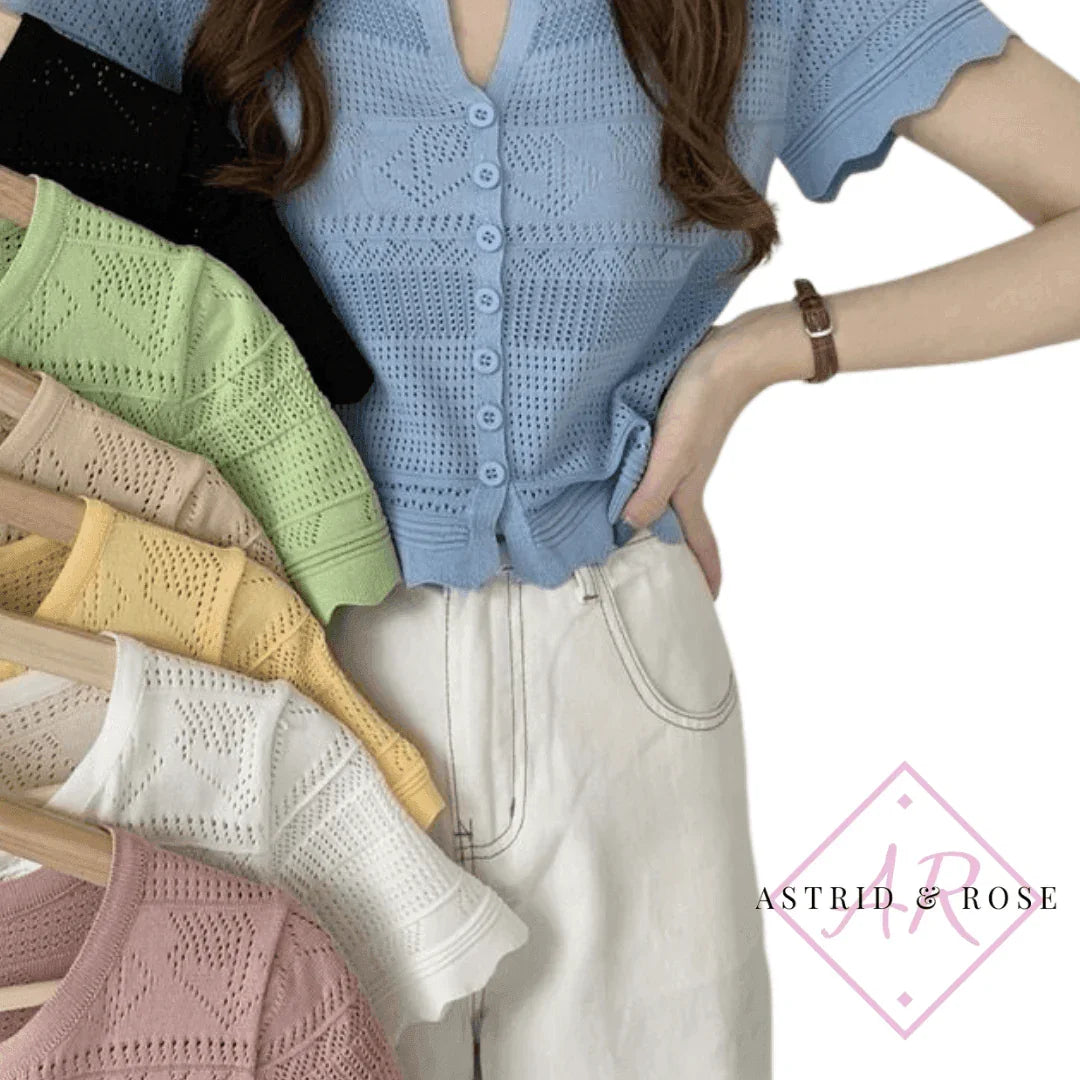 Woman in a blue knit short sleeve top, displaying similar crochet tops in various pastel colors.